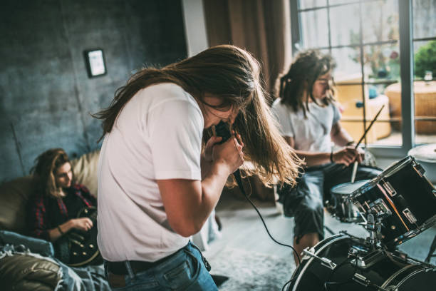 Band rehearsing together in an intimate room
