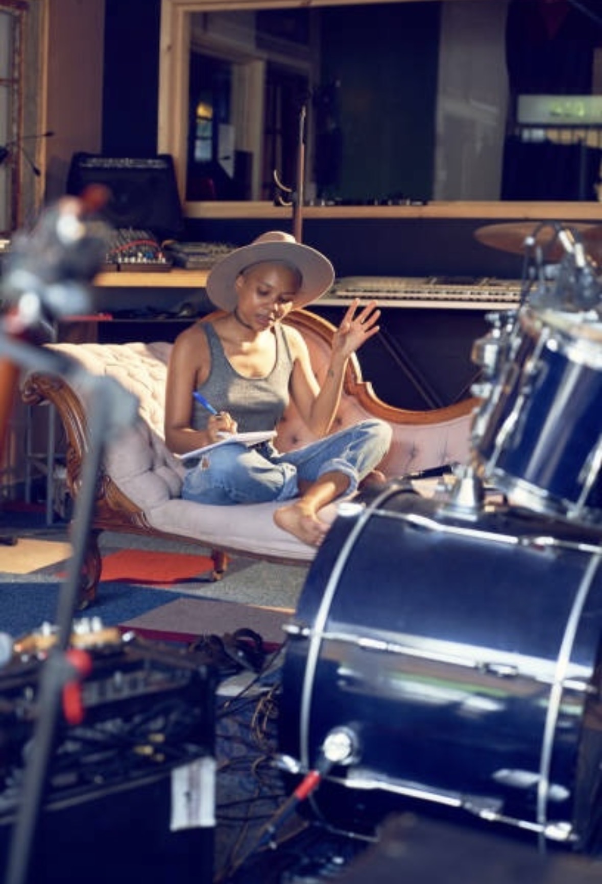 Artist writing inside a music studio